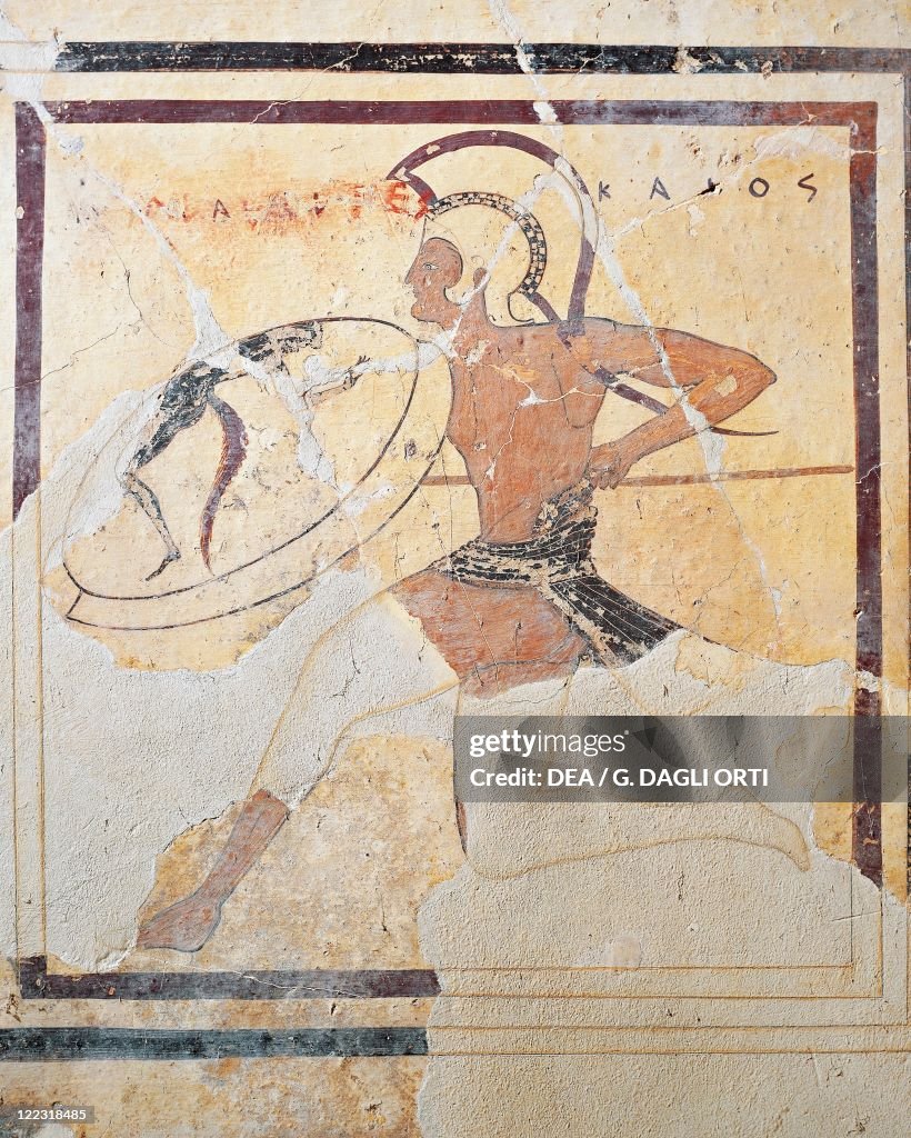 Terracotta plaque with armed Hoplite running
