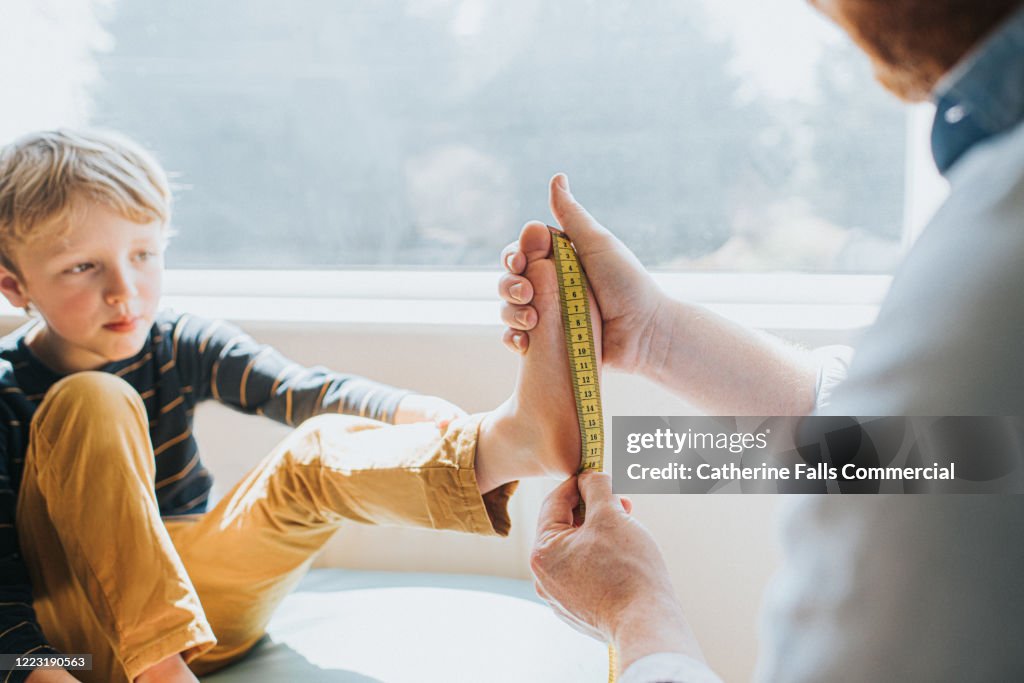 Measuring child's foot