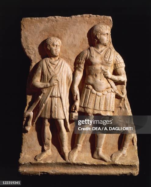 Roman civilization. Relief with centurion and soldier. From Turin, Italy.