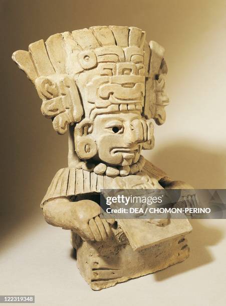 Urn depicting Cocijo the God of rain, terracotta.