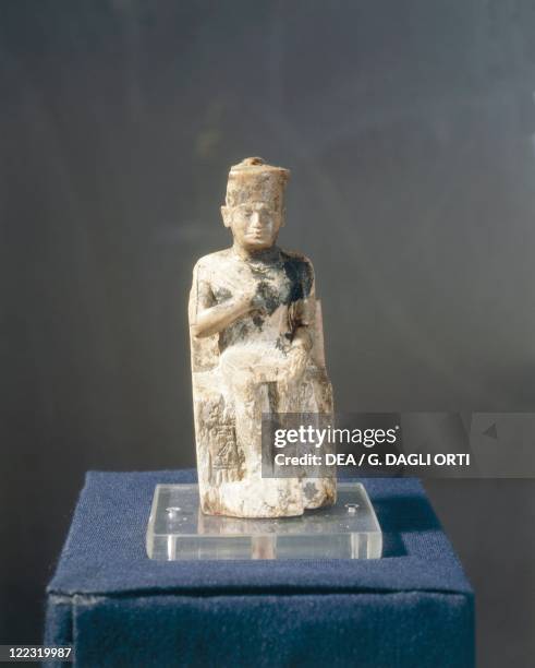 Egyptian civilization, Old Kingdom. Ivory statuette of Khufu from Abydos, h. 7 cm.