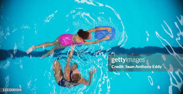 getting into the swim of things - swimming coach stock pictures, royalty-free photos & images