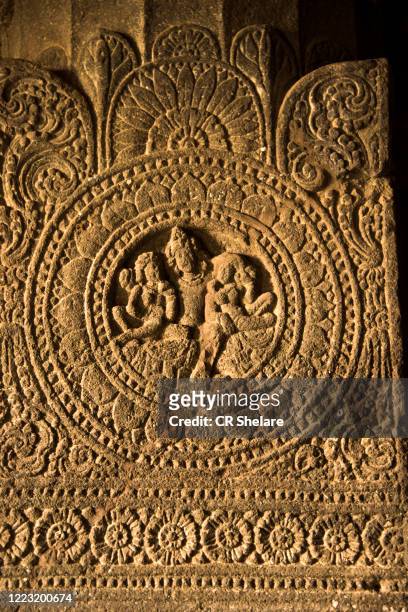 detail of stone carving inside aurangabad buddhist caves, aurangabad, maharashtra, india. - relief carving stock pictures, royalty-free photos & images