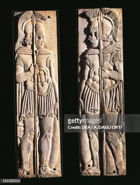 Roman civilization, 4th century b.C. Pair of bone carvings of warriors, from Praeneste .
