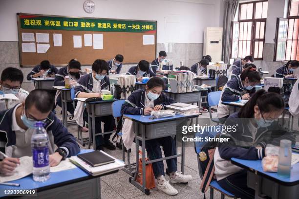 Senior students study in a classroom No. 6 Middle School on May 6, 2020 in Wuhan, Hubei Province, China .About 57,800 students in their final year...