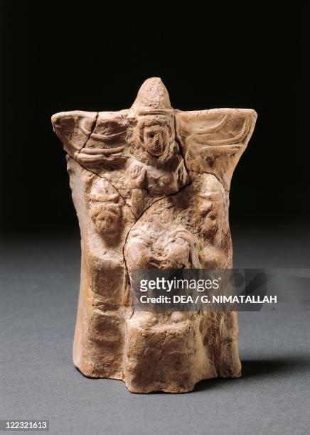Spain, Statuette of the God Ba'al Hammon seated on his throne.
