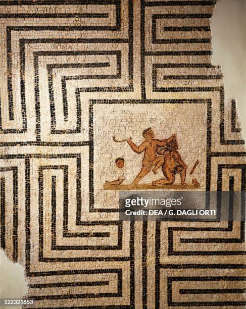Tunisia, Thuburbo Majus, Mosaic work depicting Theseus against the Minotaur in the labyrinth.