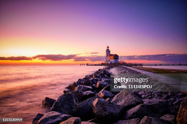 the horse of marken lighthouse - netherlands beach stock pictures, royalty-free photos & images