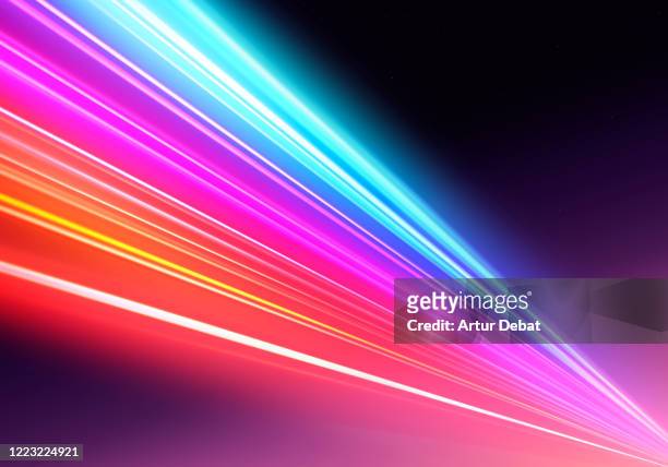 abstract picture of colorful light trails crossing twilight sky with fast motion. - future space stockfoto's en -beelden