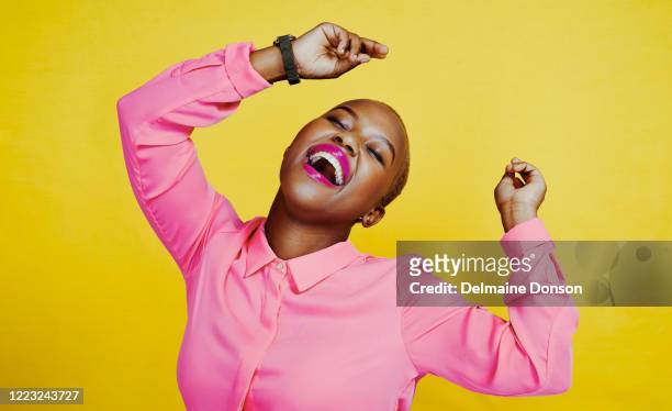 dancing is good for your body and spirit - young woman bright colour stock pictures, royalty-free photos & images