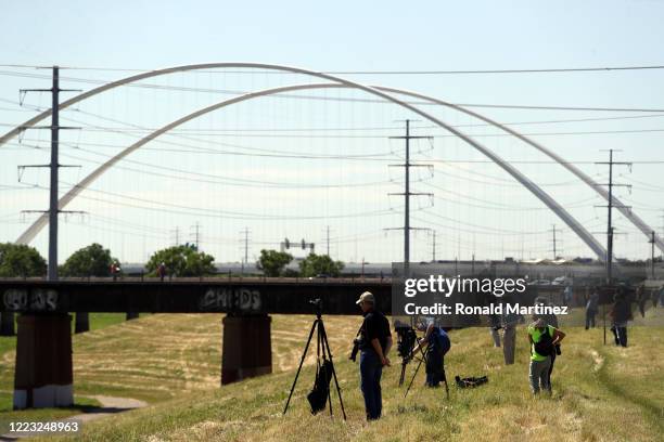 Photographer takes pictures before the U.S. Navy Blue Angels flyover downtown Dallas to honor healthcare, frontline and essential workers on May 06,...