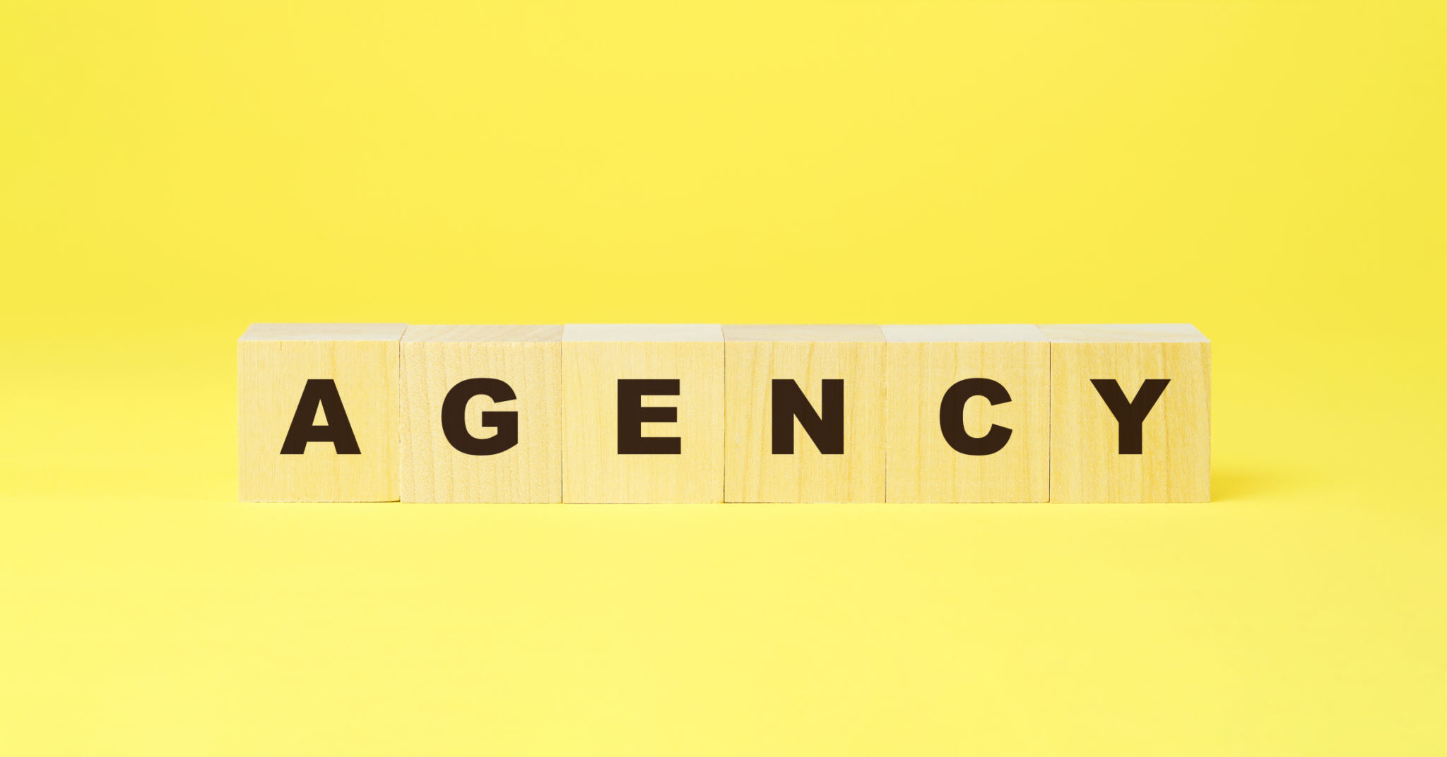 agency word on wooden blocks creative design of business startup project agency word on wooden blocks creative design of business startup project