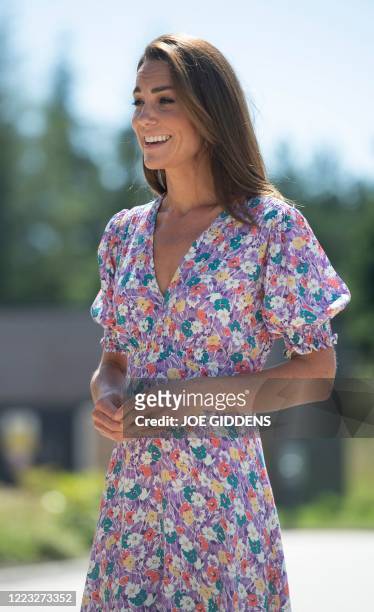 Britain's Catherine, Duchess of Cambridge, visits The Nook in the village of Framlingham Earl, south of Norwich, eastern England on June 25 which is...