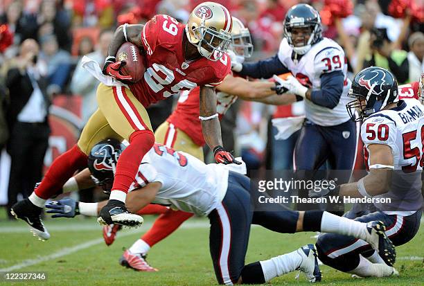 Chris Culliver of the San Francisco 49ers returning a kick off gets tackled by Shiloh Keo of the Houston Texans during an NFL pre-season football...