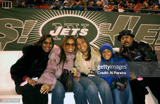 Ashanti and her sister, Shia, amd their family attend the New York Jets vs New England Patriots game at The Meadowlands on December 20, 2003 in East...