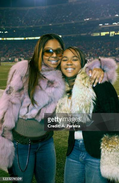 Ashanti and her sister, Shia, attend the New York Jets vs New England Patriots game at The Meadowlands on December 20, 2003 in East Rutherford, New...