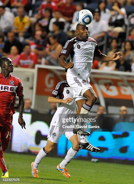 Marvell Wynne of the Colorado Rapids and Patrick Nyarko of the Chicago Fire fight for the ball in an MLS match on August 27, 2011 at Toyota Park in...