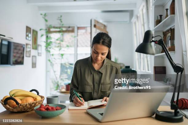 young woman looking for work - writing stock pictures, royalty-free photos & images