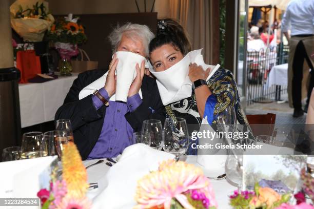 Bernd Herzsprung and his girlfriend Oezlem Schaefer during the birthday party for Ulrike Huebner at Restaurant Seehaus on June 27, 2020 in Munich,...