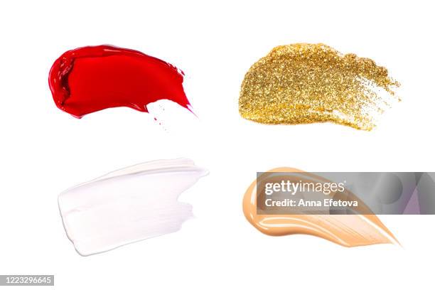 group of colorful makeup swatches - brushed gold background foto e immagini stock