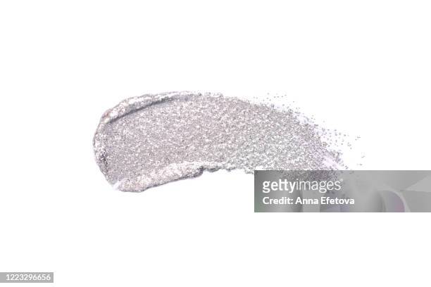 silver brushstroke of cosmetics - metalic make up stock pictures, royalty-free photos & images
