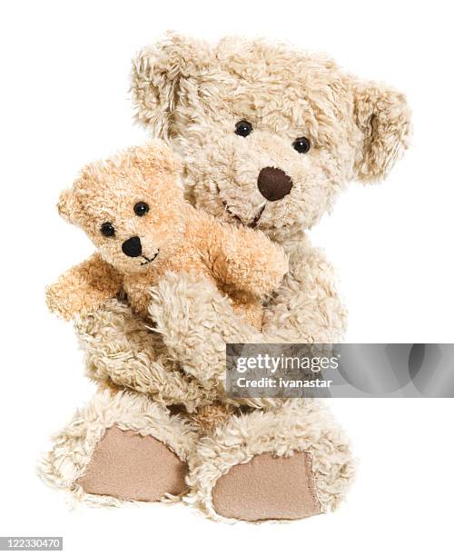 teddy bear hug isolated on white - toy animal stock pictures, royalty-free photos & images