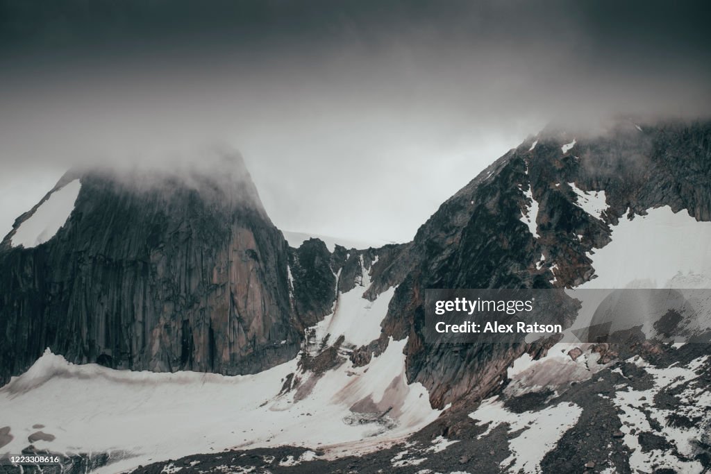 Snowpatch Spire and Bugaboo Spir in a storm