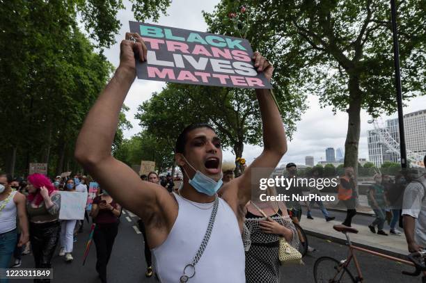 Thousands of transgender people and their supporters march through central London to Parliament Square to celebrate the Black trans community,...