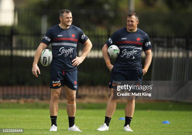 Brett Morris and Josh Morris look on during a Sydney Roosters NRL training session at Kippax Lake Field on May 07, 2020 in Sydney, Australia.
