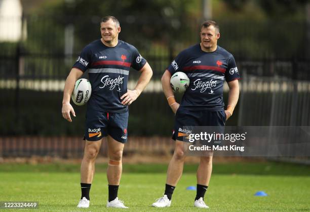 Brett Morris and Josh Morris look on during a Sydney Roosters NRL training session at Kippax Lake Field on May 07, 2020 in Sydney, Australia.