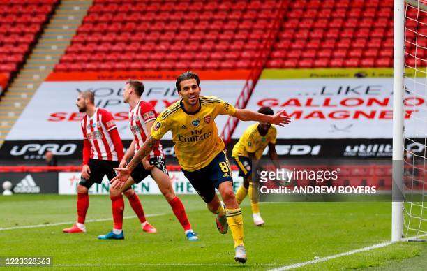 Arsenal's Spanish midfielder Dani Ceballos runs to celebrate scoring a goal during the English FA Cup quarter-final football match between Sheffield...