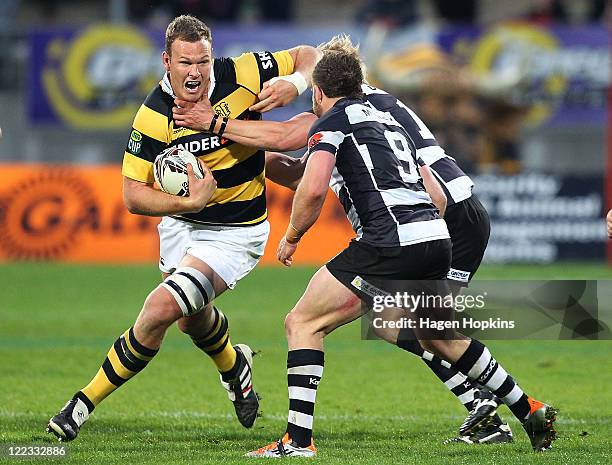 James Broadhurst of Taranaki is tackled during the round 13 ITM Cup match between Taranaki and Hawke's Bay at Yarrow Stadium on August 28, 2011 in...