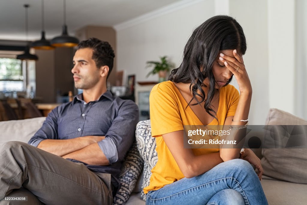 Young couple having argument at home