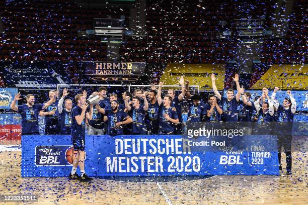 The team of Alba Berlin celebrates with the trophy after the EasyCredit Basketball Bundesliga final match between MHP Riesen Ludwigsburg and Alba...