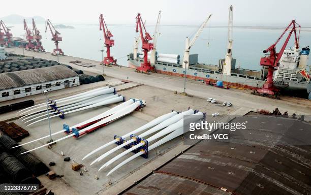 Pieces of wind turbine are pied up for shipping abroad at Lianyungang Port on May 7, 2020 in Lianyungang, Jiangsu Province of China.