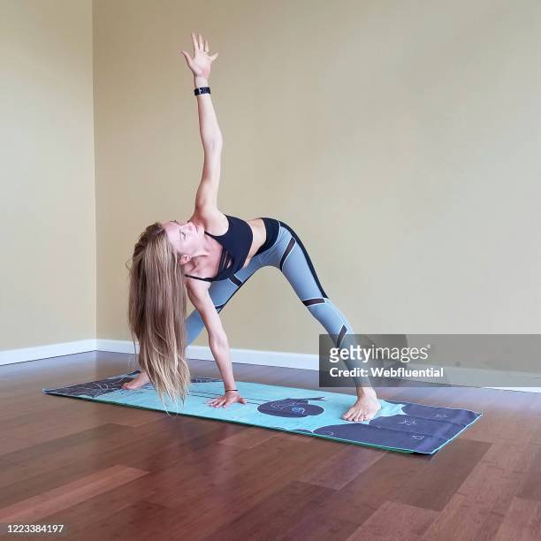 women in self isolation doing yoga - webfluential bildbanksfoton och bilder