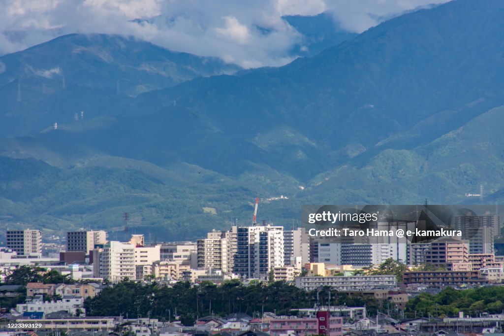 Rainy clouds on mountains and residential districts in Kanagawa prefecture of Japan