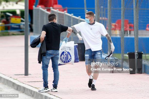 Francisco Portillo of Getafe saludates to Vitorino Antunes arrives to take a medical test at Ciudad Deportiva Getafe to check the state of their...