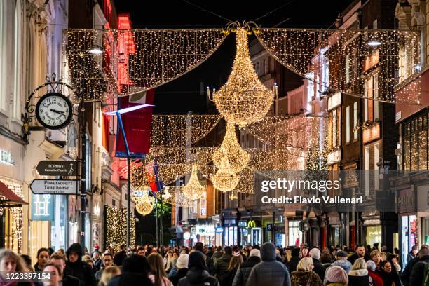 christmas in dublin, ireland - grafton street at christmas - christmas shopping stock pictures, royalty-free photos & images