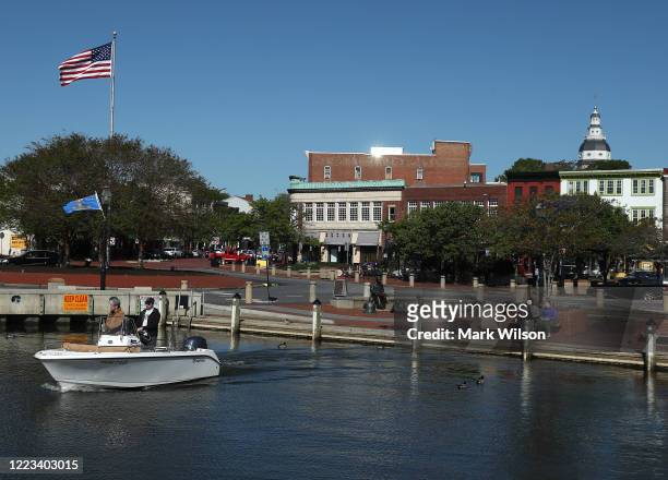 Boaters pull away from the city dock, on May 7, 2020 in Annapolis, Maryland. Governor Larry Hogan has relaxed the ban on outdoor activities, such as...