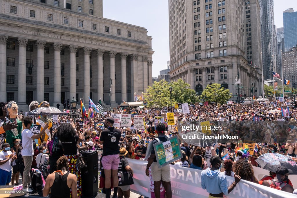 Gay Rights Rally People wearing masks participate during the the Queer March for Black ...
