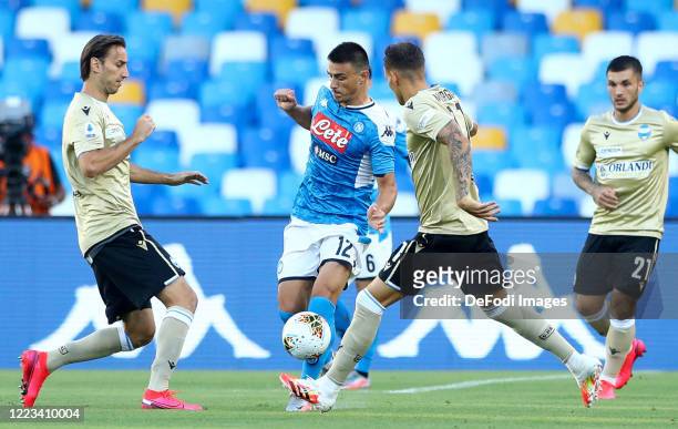 Simone Missiroli of SPAL, Eljif Elmas of Napoli and Gabriel Strefezza of SPAL battle for the ball during the Serie A match between SSC Napoli and...