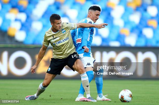 Arkadiusz Reca of SPAL and Jose Maria Callejon of Napoli battle for the ball during the Serie A match between SSC Napoli and SPAL at Stadio San Paolo...