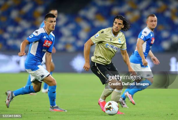 Eljif Elmas of Napoli, Stanislav Lobotka of Napoli and Stanislav Lobotka of Napoli battle for the ball during the Serie A match between SSC Napoli...