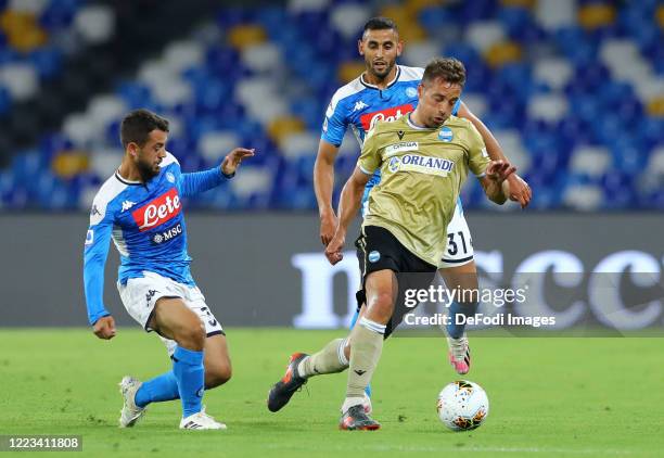 Amin Younes of Napoli, Faouzi Ghoulam of Napoli and Thiago Cionek of SPAL battle for the ball during the Serie A match between SSC Napoli and SPAL at...