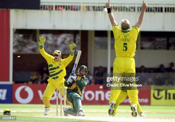 Gary Kirsten of South Africa is bowled by Shane Warne of Australia in the World Cup semi-final at Edgbaston in Birmingham, England. The match...