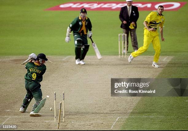 Mark Boucher of South Africa is bowled by Glenn McGrath of Australia in the World Cup semi-final at Edgbaston in Birmingham, England. The match...
