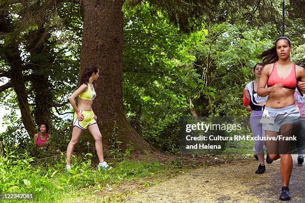 runners racing in marathon - bathroom exercise stock pictures, royalty-free photos & images