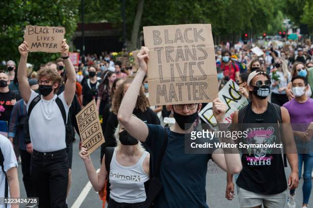 Thousands of transgender people and their supporters march through central London to Parliament Square to celebrate the Black trans community,...