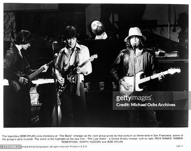 Rick Danko, Robbie Robertson, Garth Hudson of The Band with Bob Dylan perform at their farewll concert released on film as 'The Last Waltz' at...
